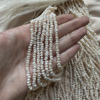 Жемчуг натуральный "Рис" плоский, 2*4 мм, 17 см нить