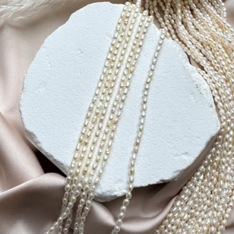 Жемчуг натуральный "Рис", 2,5*3 мм, AAA, нить